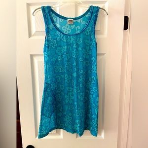 Swim suit cover up. Teal patterned nylon & spandex.